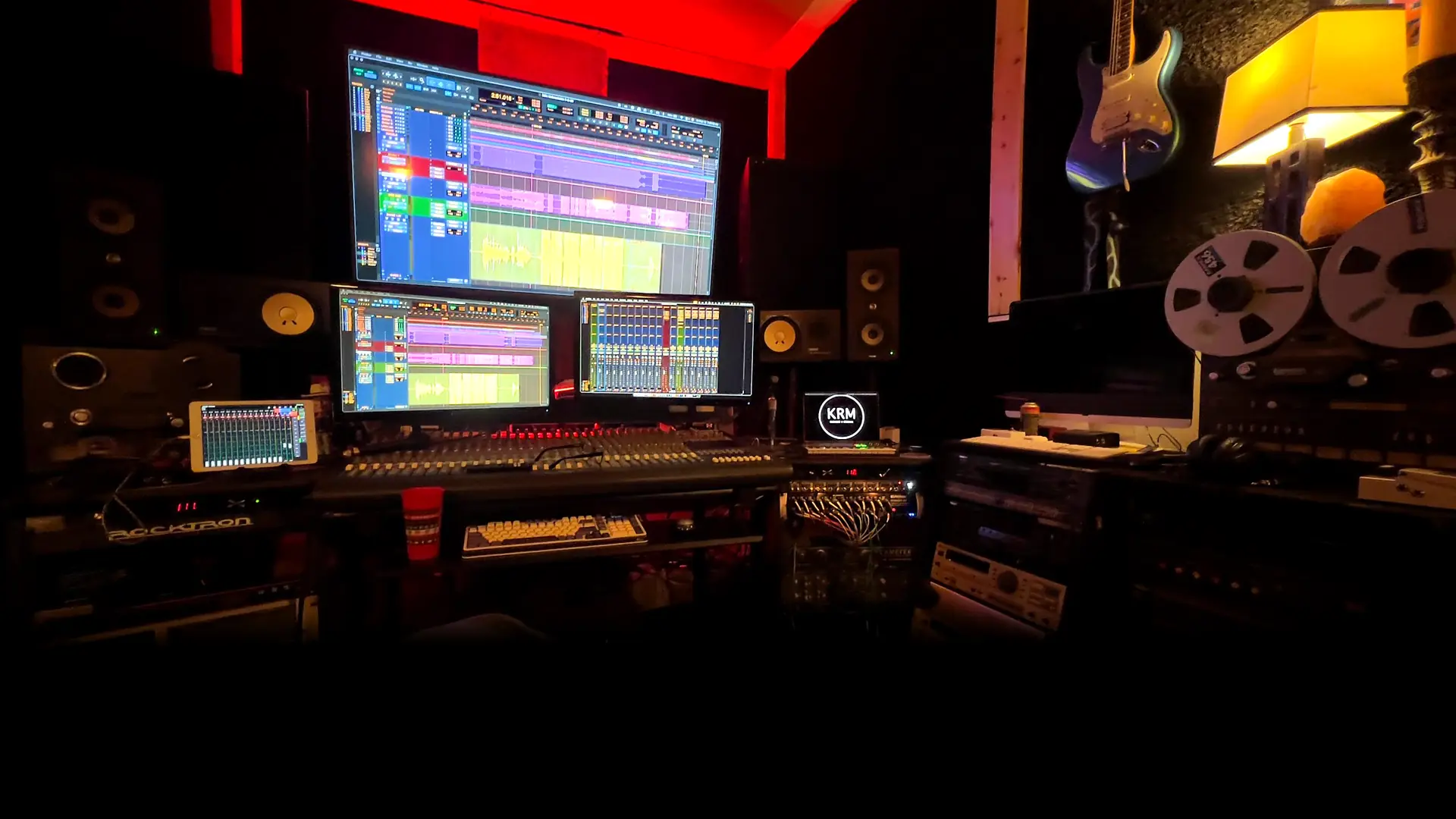 KRM Studios main control room with console, screens and tape machine