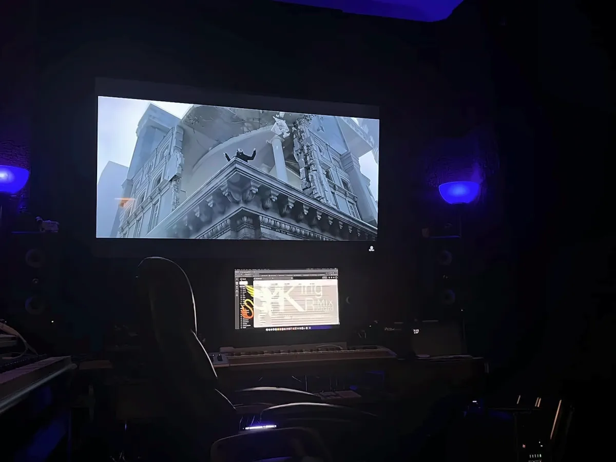 The Dolby Atmos room at KRM Studios with its big screen and mix desk